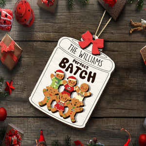 Personalized family wooden ornament featuring gingerbread cookies for a festive holiday decor