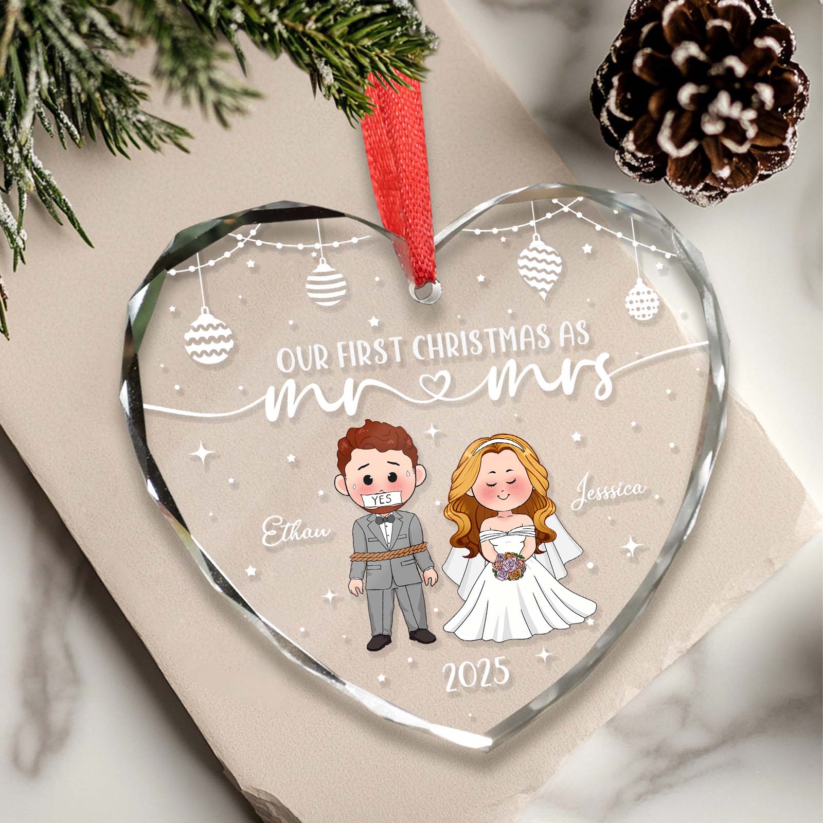 Personalized first Christmas ornament in heart shape featuring a bride and groom with names and date