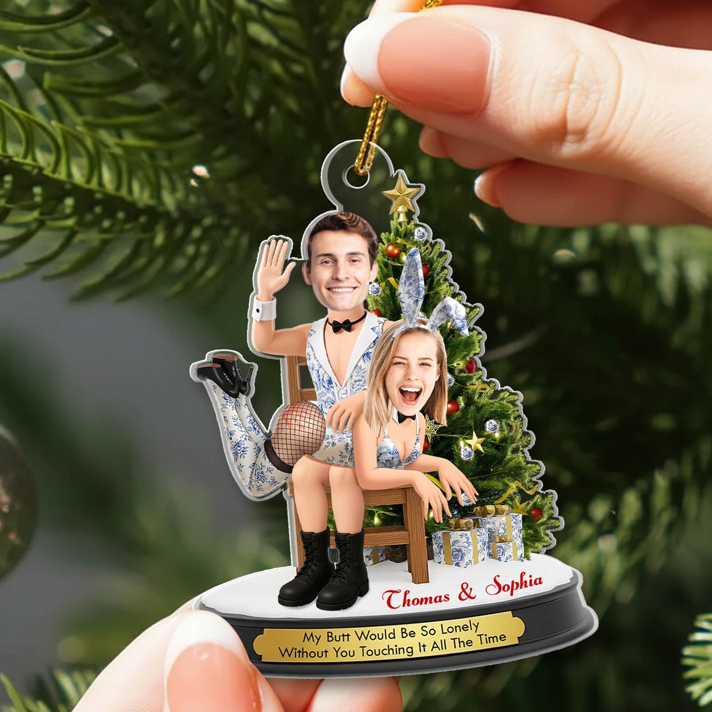 Personalized funny couple Christmas ornament featuring Thomas and Sophia by a Christmas tree