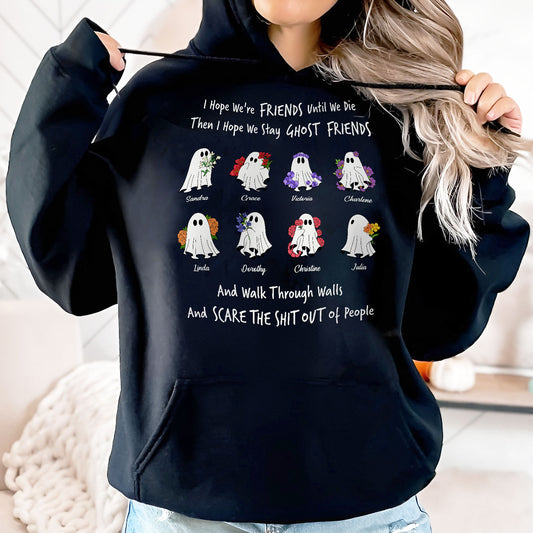 Black hoodie featuring a personalized ghost friends shirt design with cartoon ghost characters and custom names