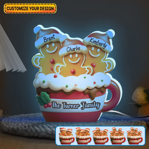 Personalized gingerbread Christmas light box featuring custom names on gingerbread figures for festive decor