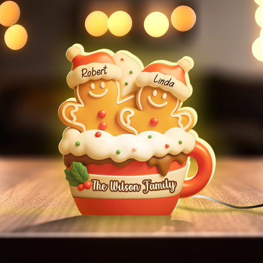 Personalized gingerbread Christmas light box featuring two gingerbread figures and custom family name