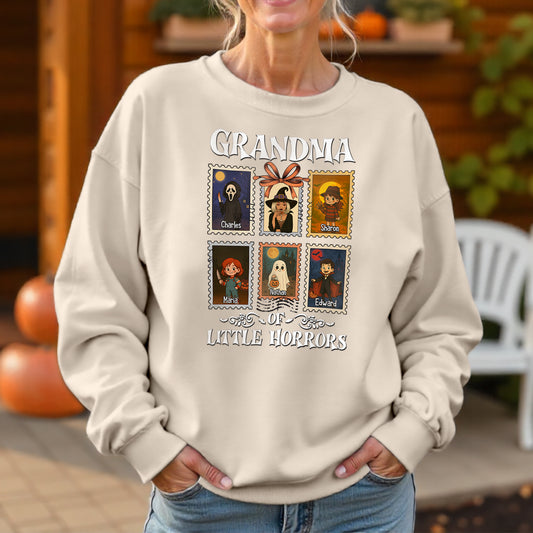 Personalized grandma halloween shirt with cartoon horror characters and custom names on a beige sweatshirt