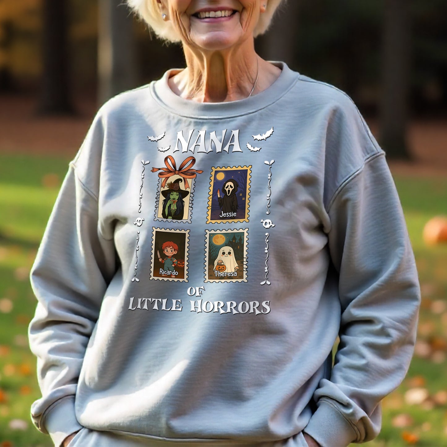 Personalized grandma halloween shirt with cartoon spooky characters and names on gray sweatshirt