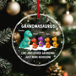 Personalized Grandmasaurus ornament featuring colorful dinosaur characters and custom names on a festive background