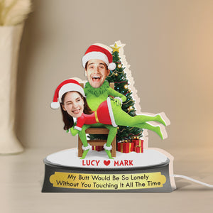Personalized Grinch Christmas gift featuring a custom photo display with festive decorations