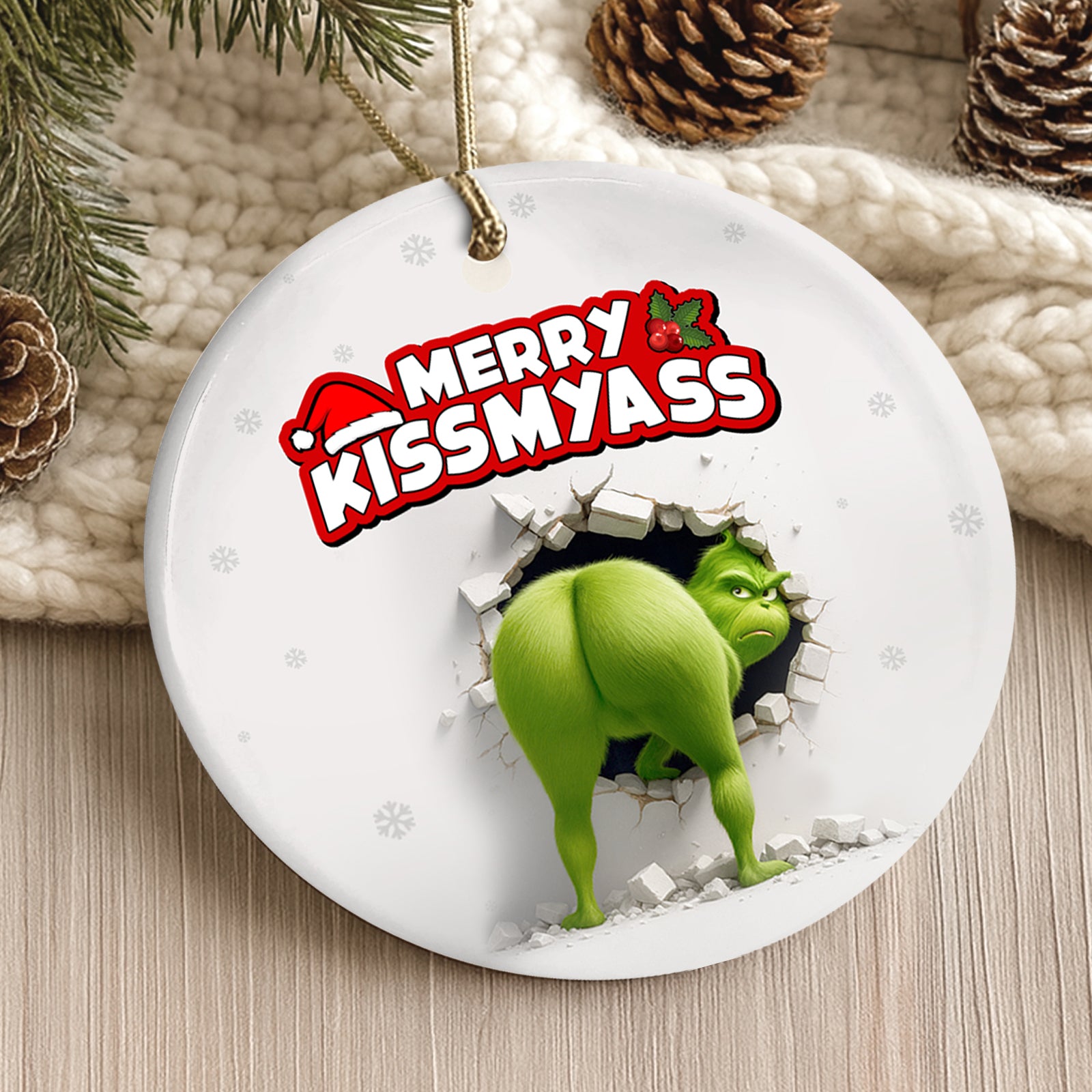 Funny personalized Grinch Christmas ornament featuring the Grinch breaking through a wall with a humorous message