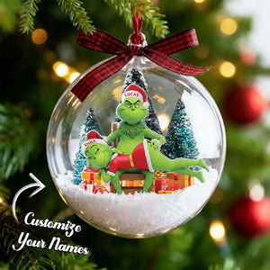 Personalized Grinch couple ornament featuring customizable names with festive decorations
