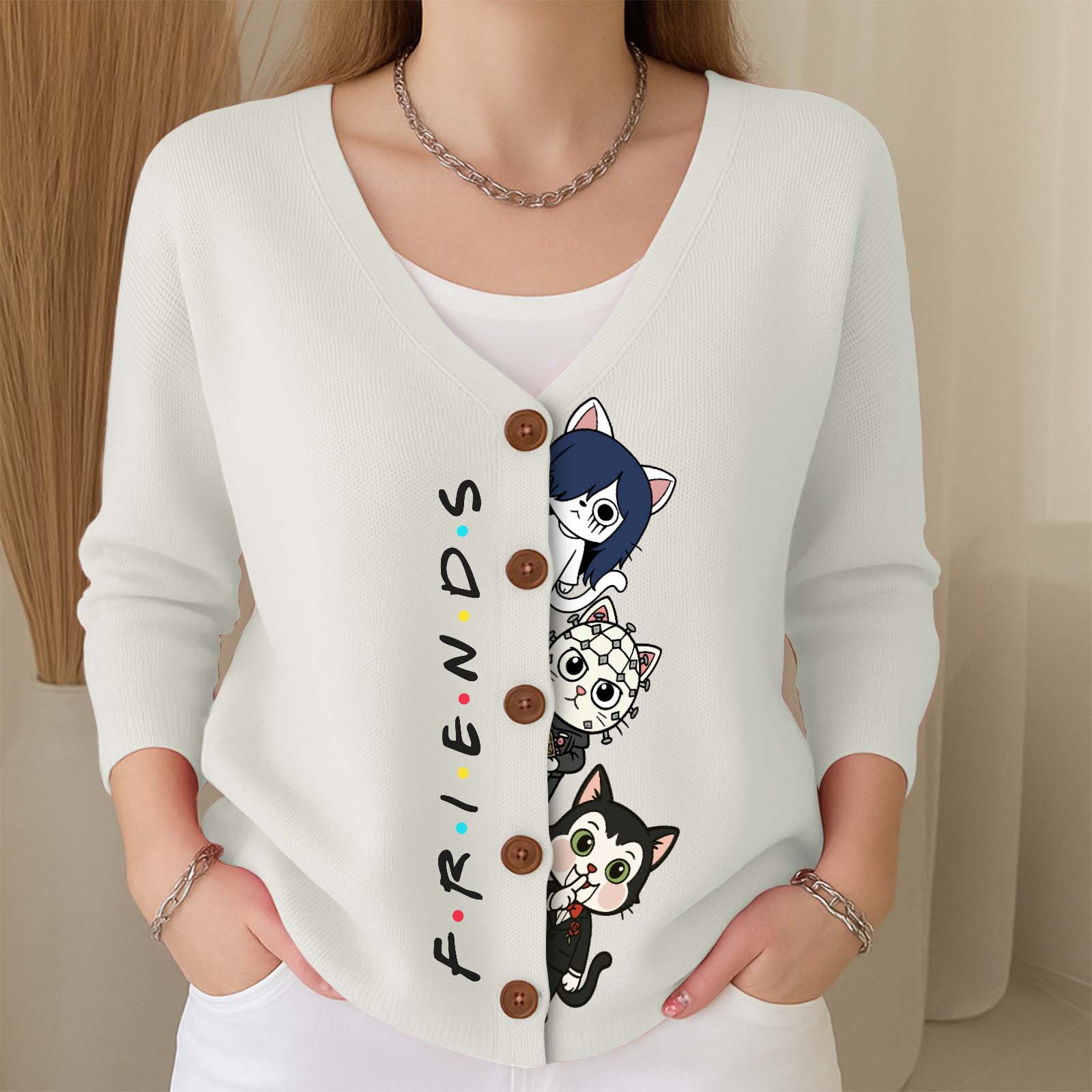 White personalized Halloween cat cardigan featuring playful cat designs and button details