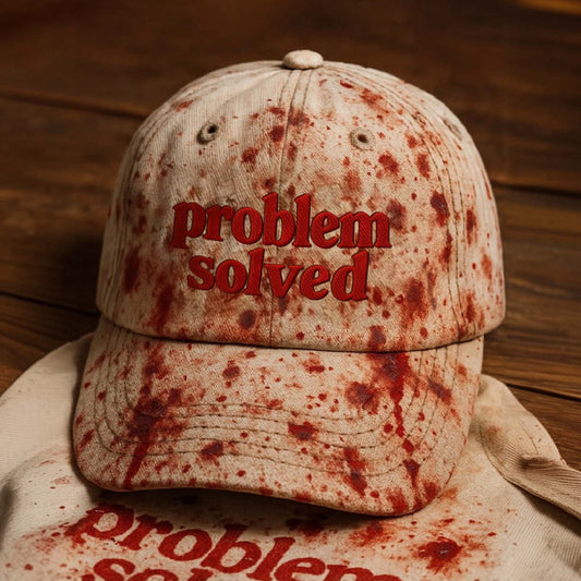 Beige personalized Halloween hat with red splatter design and problem solved embroidery on front