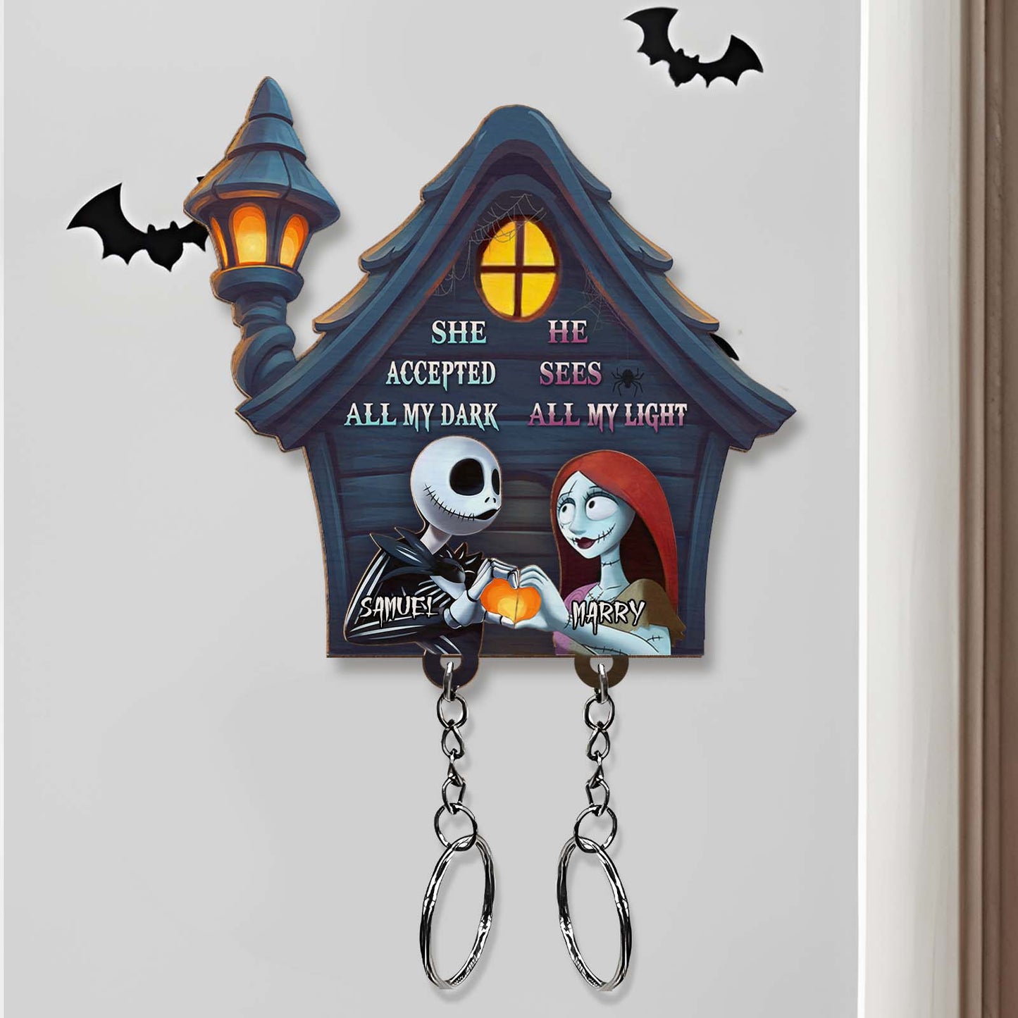 Personalized Halloween keychain featuring spooky house design with Jack and Sally characters