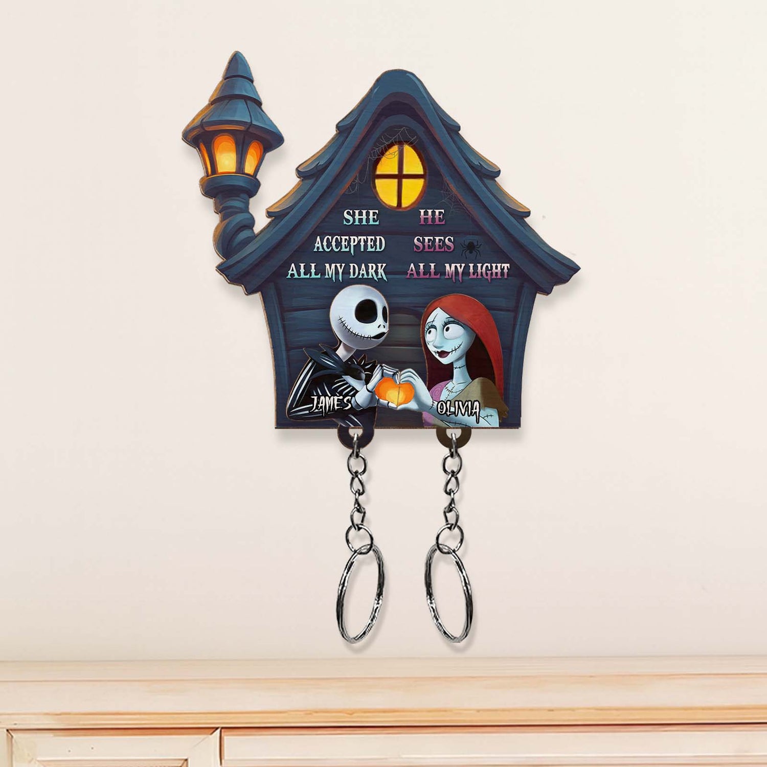 Personalized Halloween keychain with a haunted house design featuring Jack and Sally