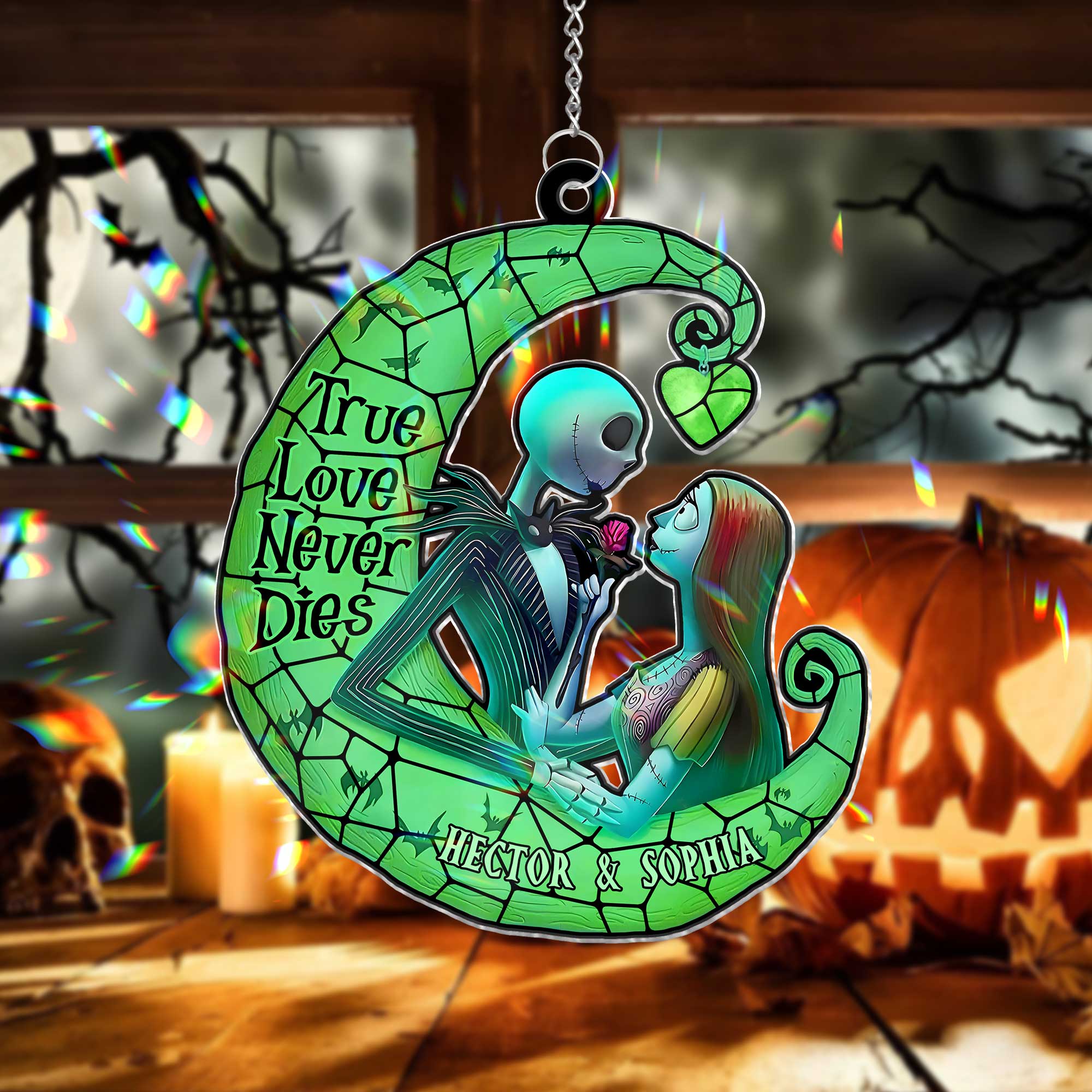 Personalized Halloween suncatcher ornament featuring skeleton couple in green crescent moon with True Love Never Dies text