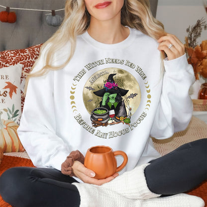 White personalized Halloween sweatshirt with witch graphic and text this witch needs red wine