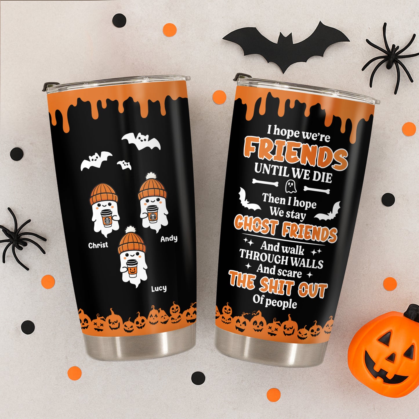 Personalized Halloween tumbler with spooky ghost friends design and Halloween-themed orange and black decor