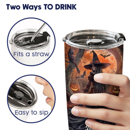 Personalized Halloween witch tumbler with straw and sip options held in hand featuring witch and pumpkin design