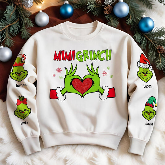 Personalized Mimi Grinch Christmas shirt with custom names and festive Grinch designs on white sweatshirt