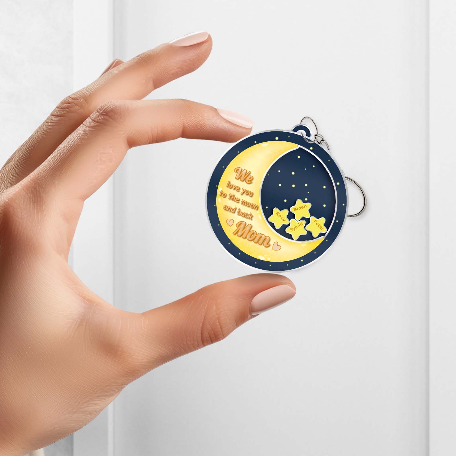 Personalized mom shaking keychain with a moon and stars design for a thoughtful gift