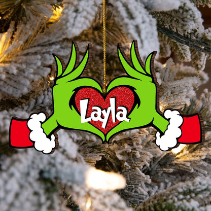 Personalized monster family Christmas ornament with green hands forming heart shape and name Layla
