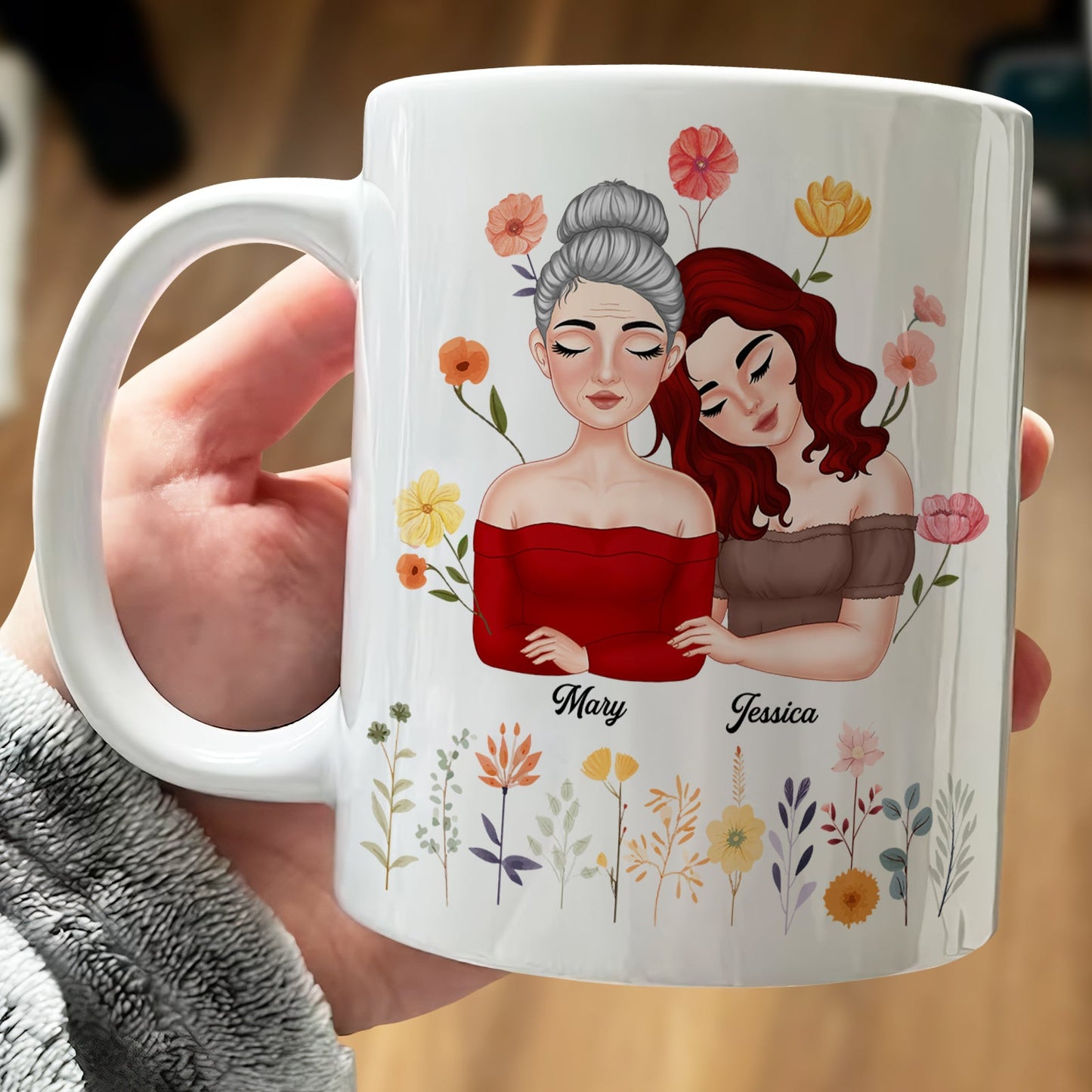 Personalized mother daughter mug featuring two women with floral designs and their names Mary and Jessica