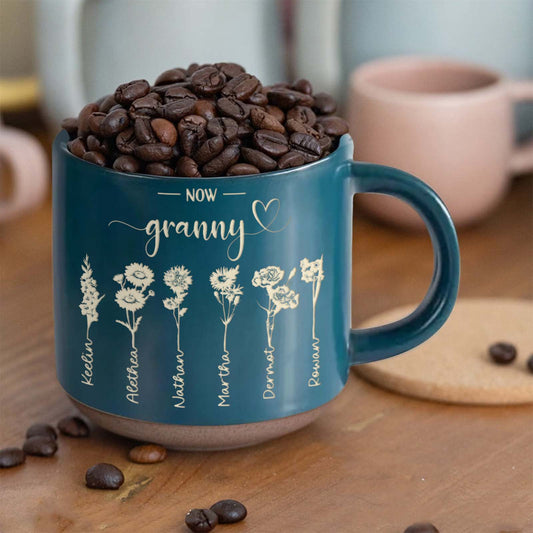 Personalized nanny mug in teal with flower graphics and names for a thoughtful gift