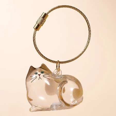 Personalized pet keepsake gift featuring a clear glass cat figurine with detailed features