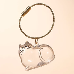 Clear glass cat-shaped keychain as a personalized pet keepsake gift for pet lovers