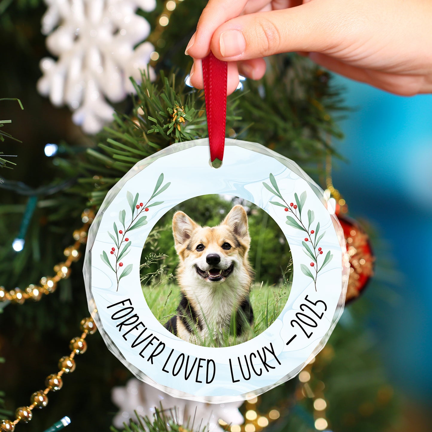Personalized pet memorial ornament with photo of a dog and the text Forever Loved Lucky 2023