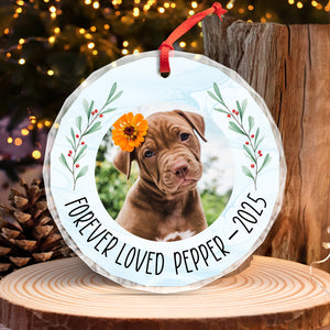 Personalized pet memorial ornament featuring a photo of a dog with a floral design and text for remembrance