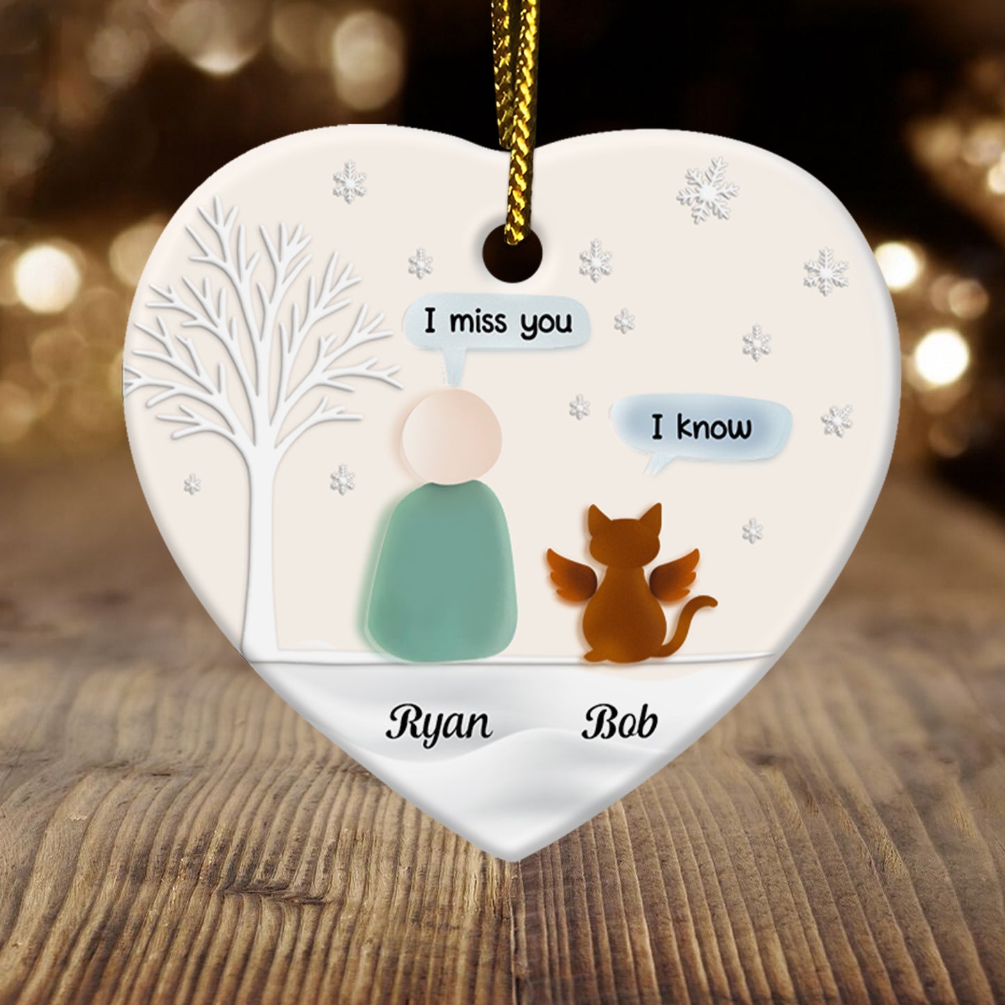 Personalized pet memorial ornament featuring a heart design with a person and cat saying I miss you and I know