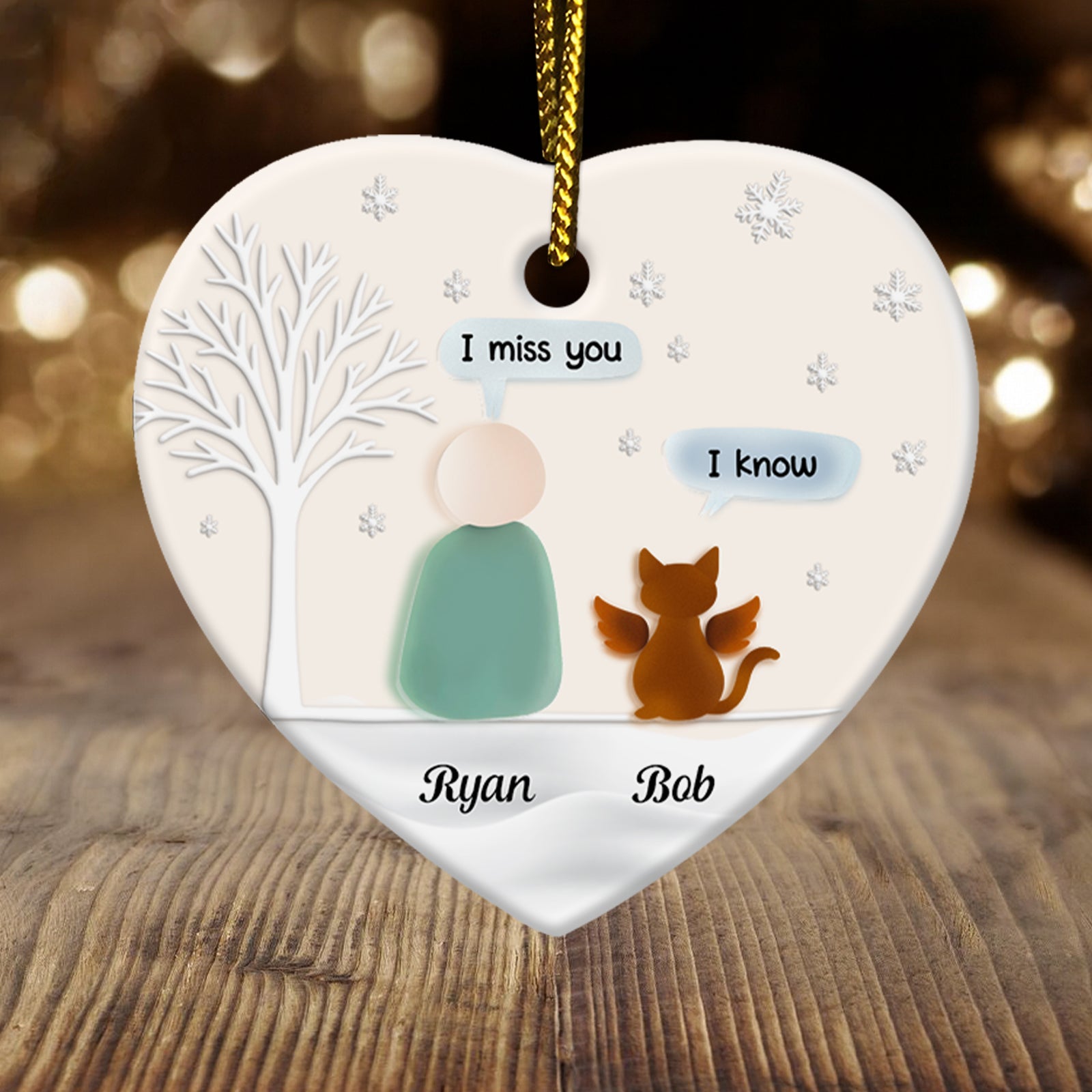 Personalized pet memorial ornament featuring a heart design with a person and cat saying I miss you and I know