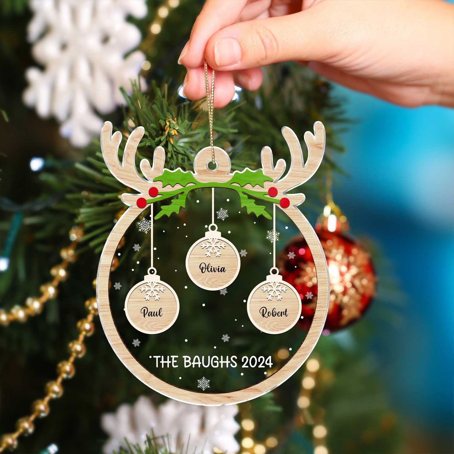 365Gifty personalized pet paw Christmas ornament with reindeer design and custom names hanging on tree
