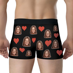Personalized photo boxers featuring multiple heart designs and custom images on a black background