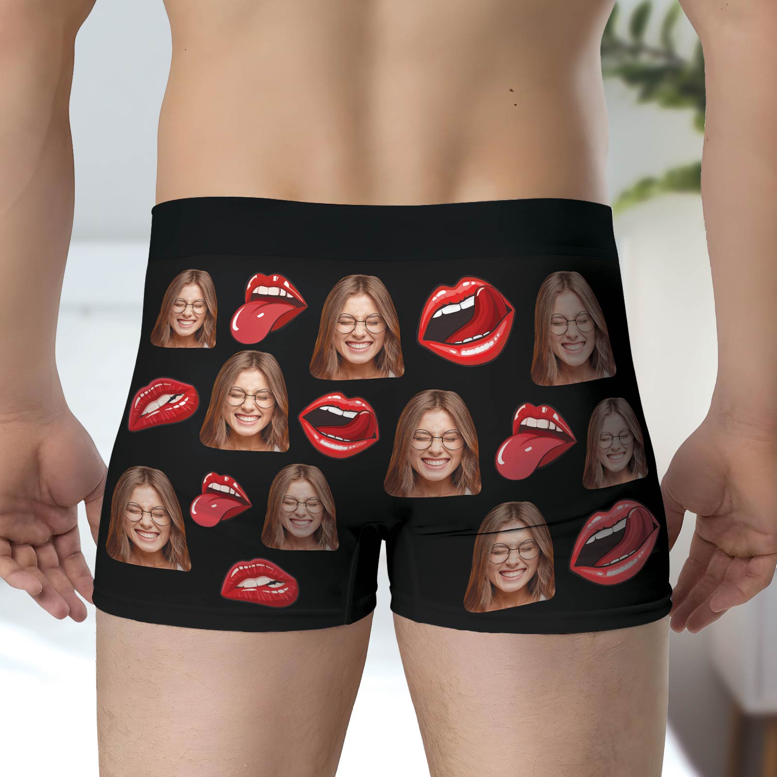 Personalized photo boxers for couples featuring fun lip and face graphics on a black background