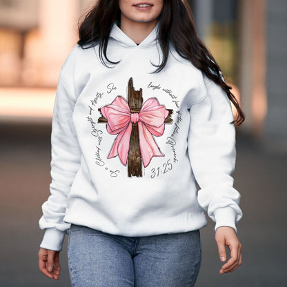 White hoodie featuring personalized pink bow t-shirt design with wooden cross and script text