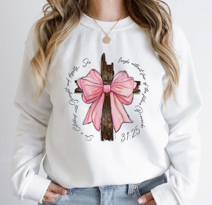 White sweatshirt with personalized pink bow t-shirt design featuring a wooden cross and scripture text