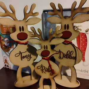 Personalized reindeer family decoration with three wooden reindeer named Tony Debbie and Ruby by 365Gifty
