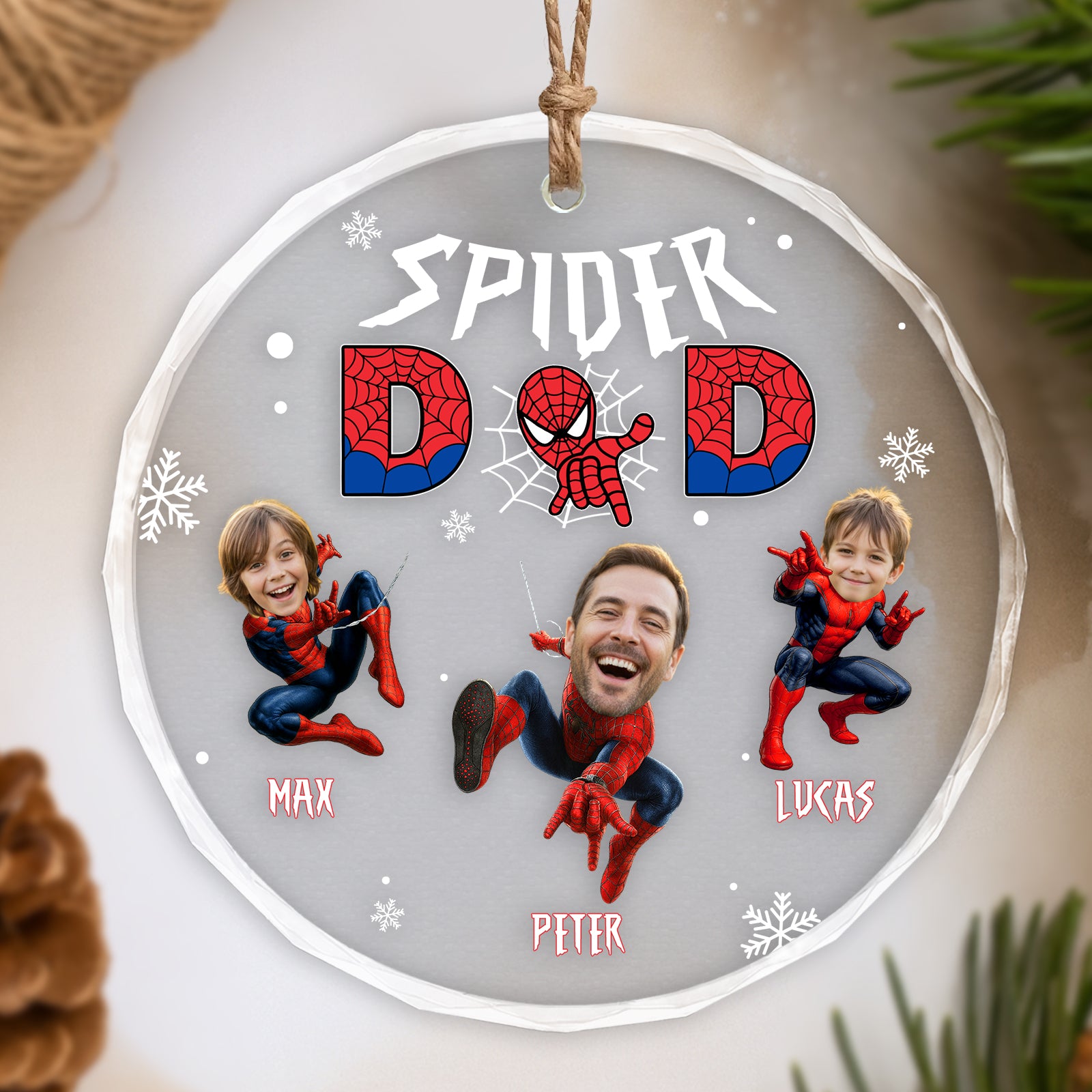Personalized spider family ornament featuring two kids and a father in spider costumes with festive decorations