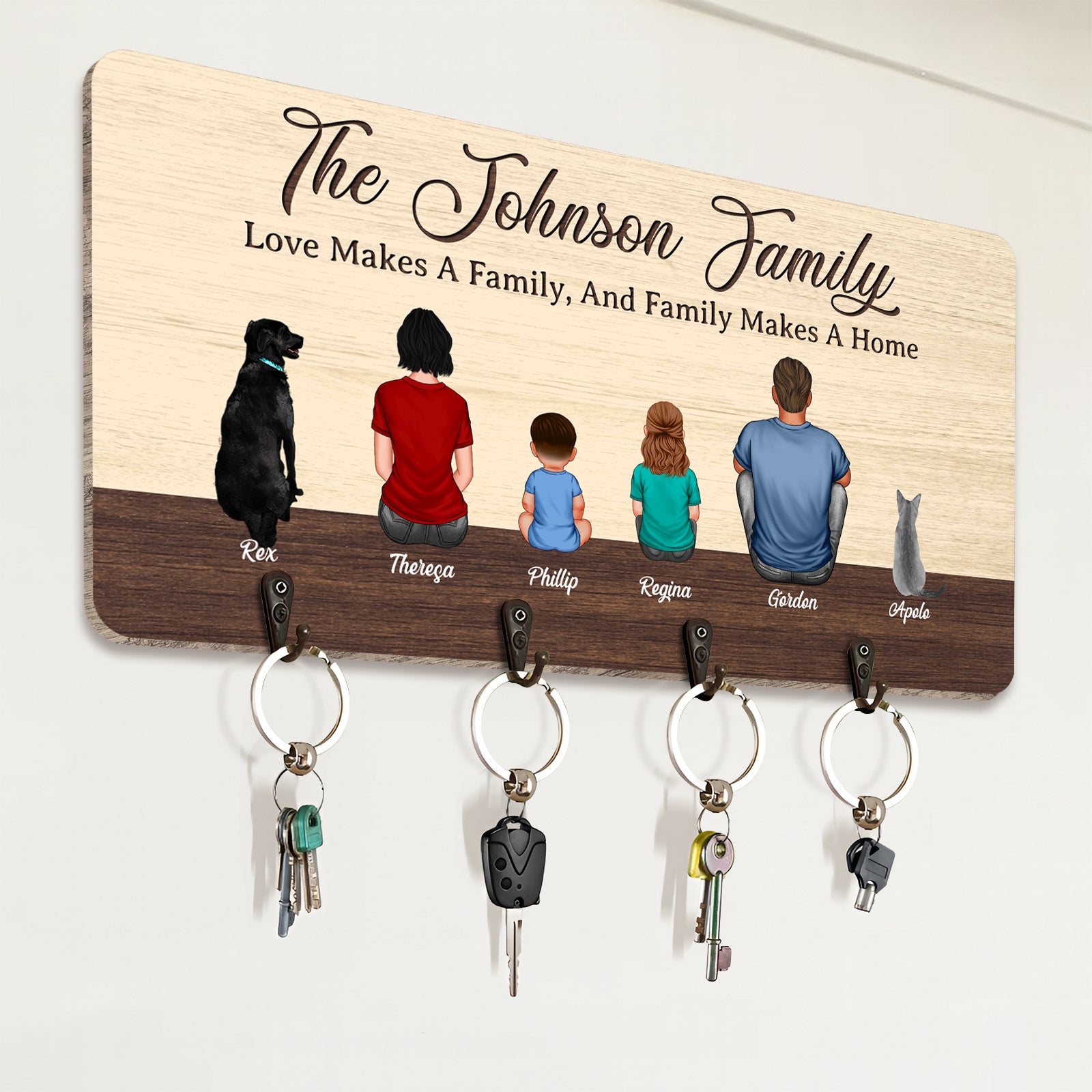 Personalized wooden key hanger featuring a family illustration with key holders for organization