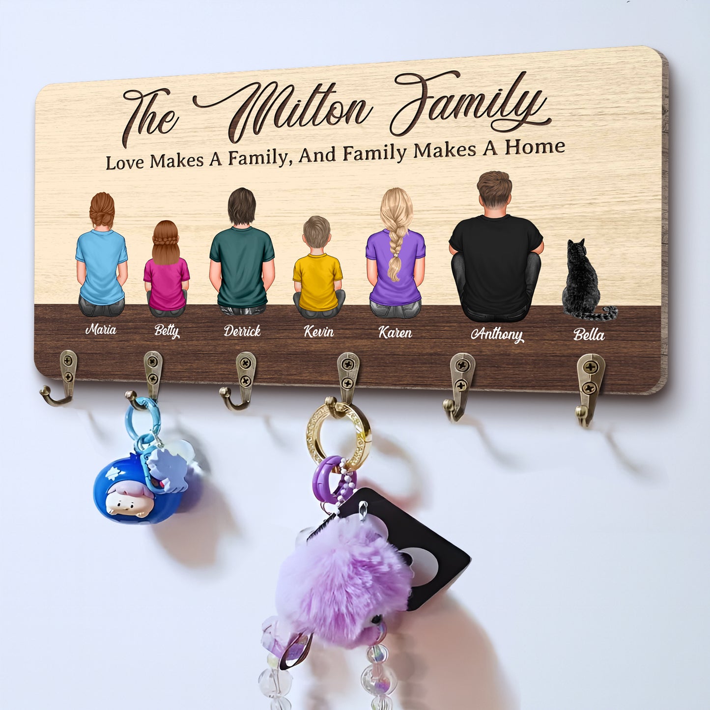 Personalized wooden key hanger featuring a family design with multiple hooks for organizing keys