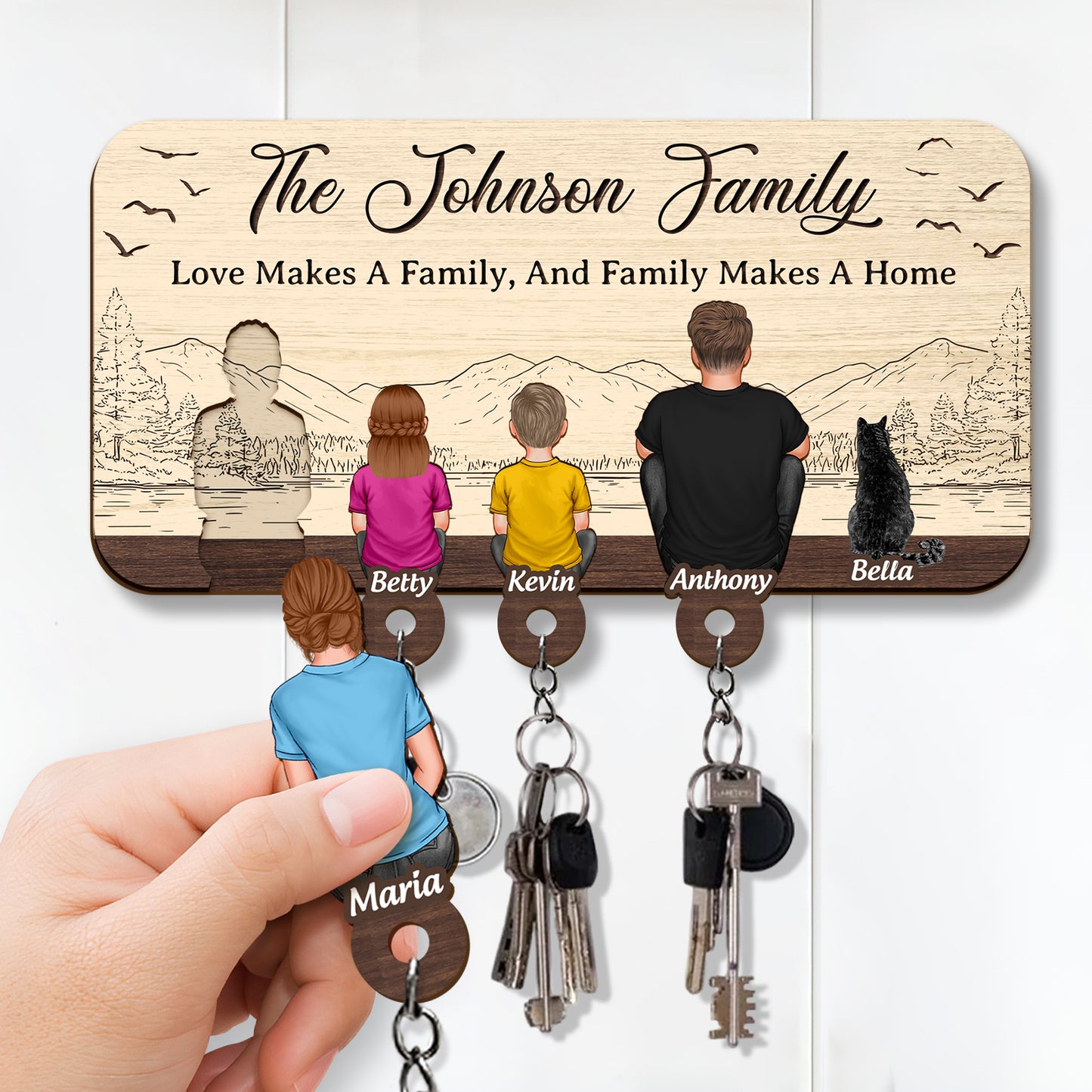Personalized wooden key holder featuring family silhouettes and customizable names for home organization