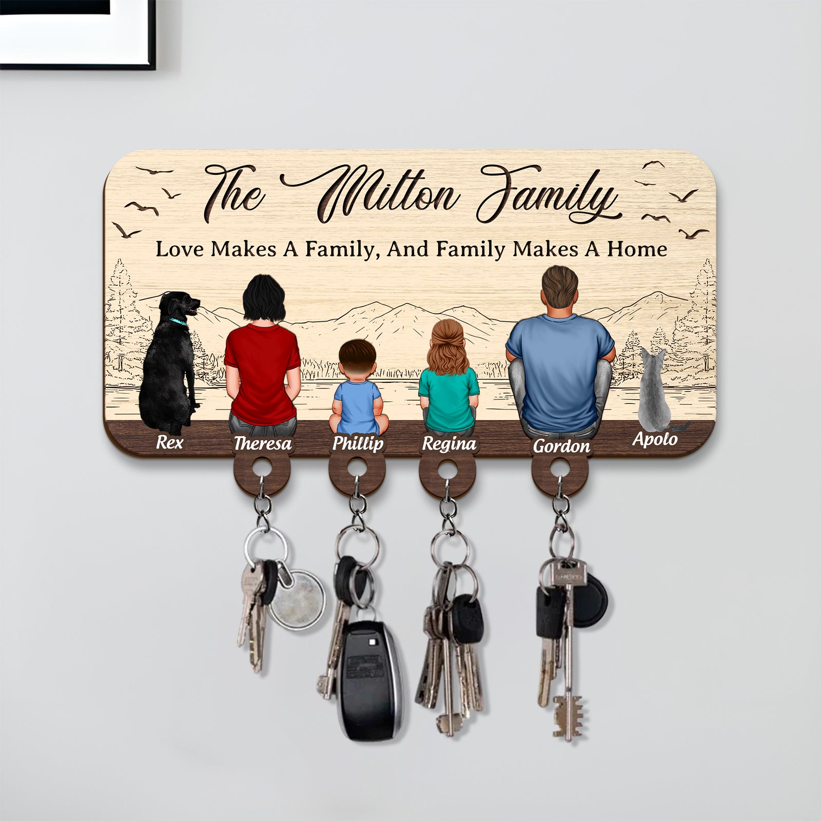 Personalized wooden key holder featuring a custom family illustration for home organization