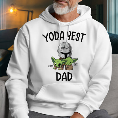 White personalized Yoda dad shirt featuring cartoon Yoda and Mandalorian helmet with custom names