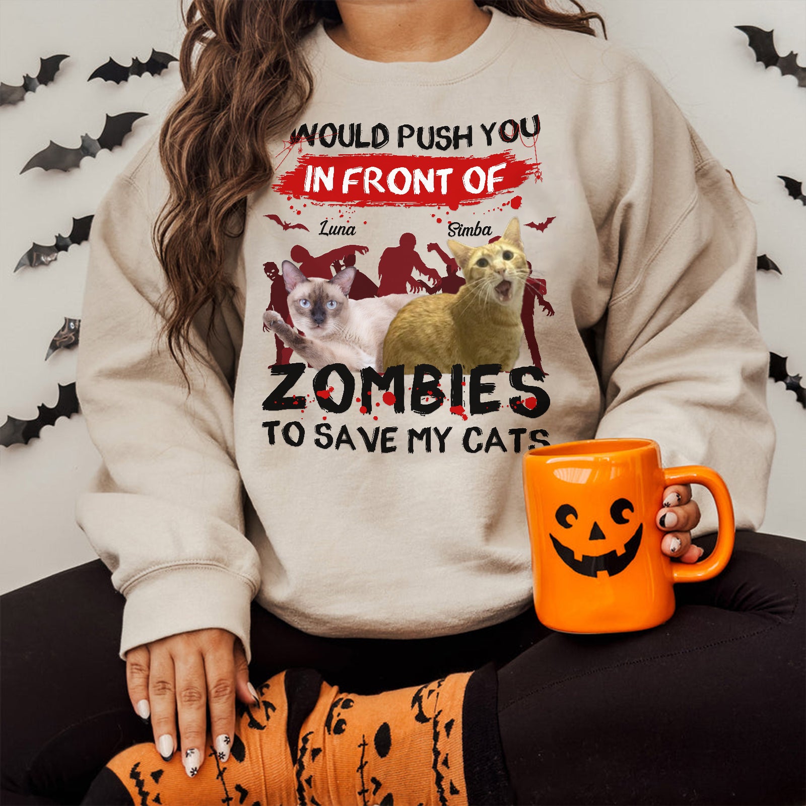 Personalized zombie pet shirt with cat names Luna and Simba Halloween design on beige sweatshirt