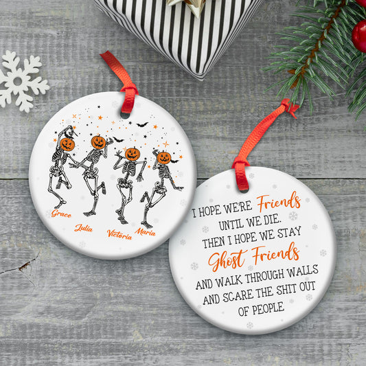 Two round ceramic ornaments with dancing skeletons pumpkin heads with personalized names unique ghost friends Christmas gift