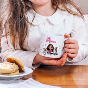 Child holding 365Gifty personalized pet lover mug with cartoon girl Anna and two dogs and cookies on table