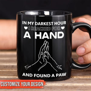Black ceramic personalized pet lover mug with white hand and paw graphic and sentimental text