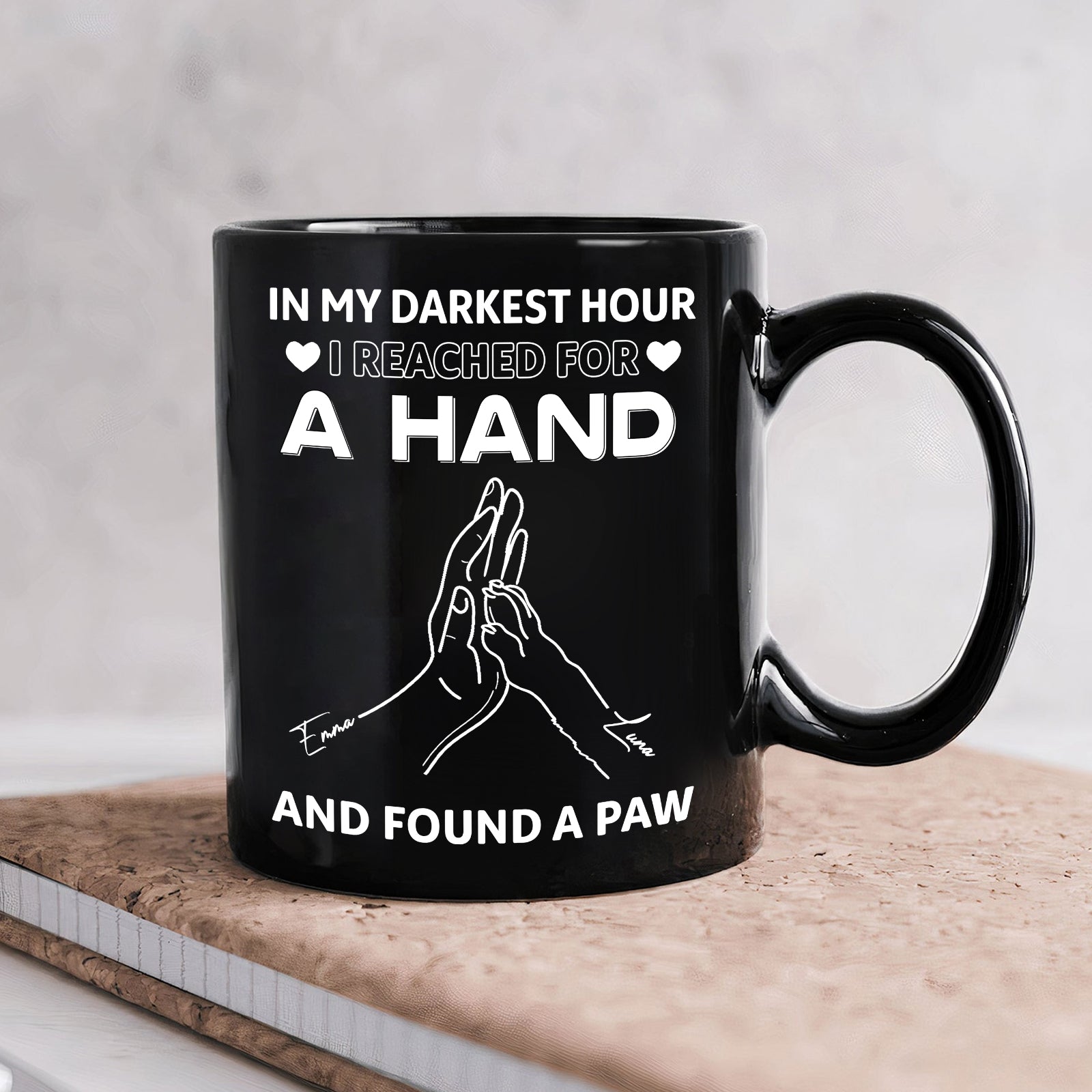 Black ceramic personalized pet lover mug with white hand and paw graphic and sentimental quote gift for animal lovers