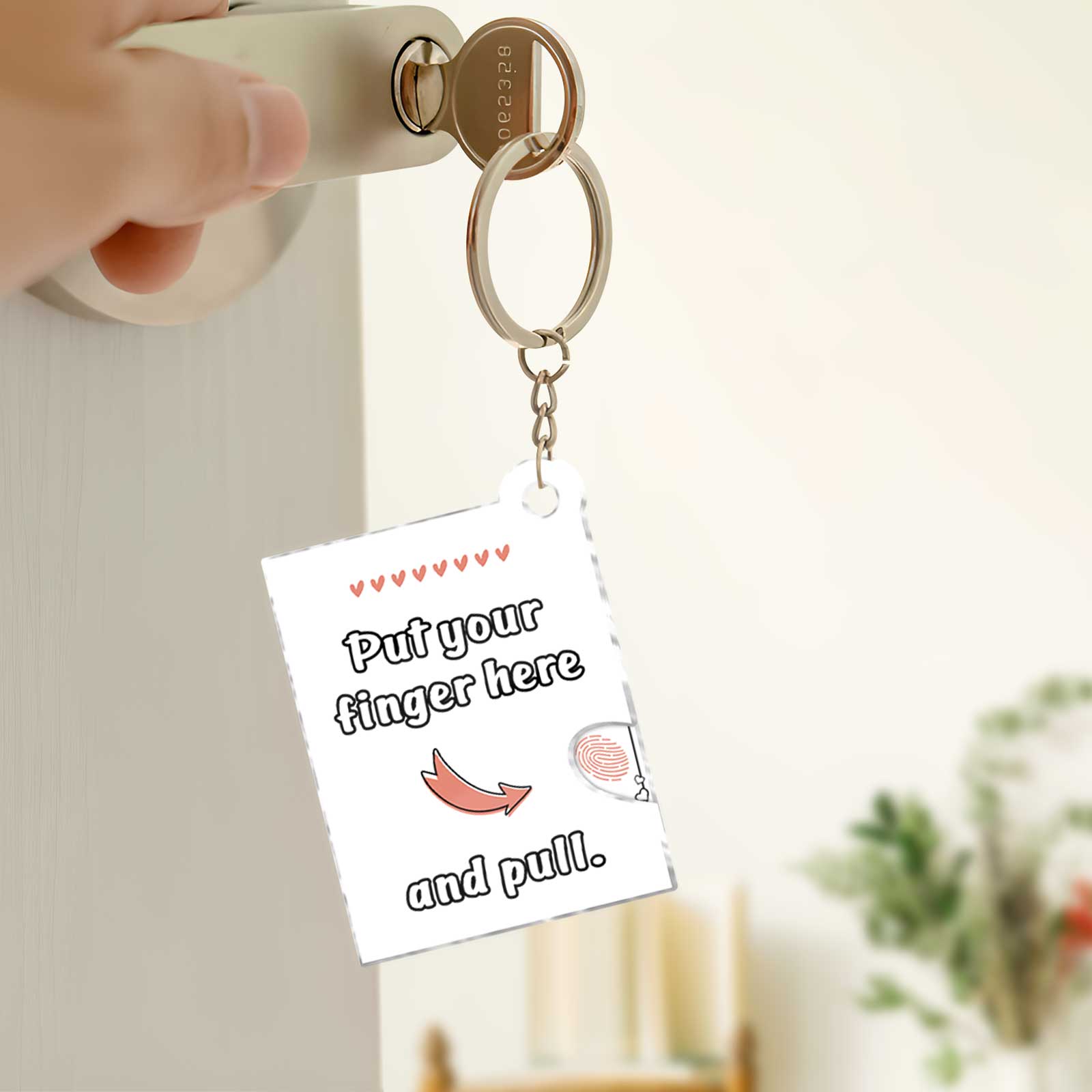 Photo acrylic slider card keychain featuring a playful design with an instruction to pull