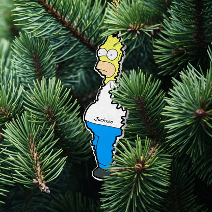 Personalized Christmas acrylic ornament featuring a cartoon character named Jackson hanging on green pine tree